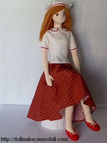 Girl doll in white and red