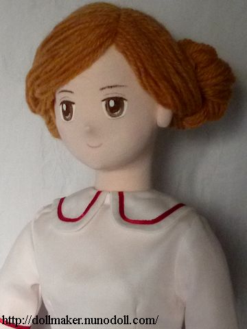Doll with wool hair