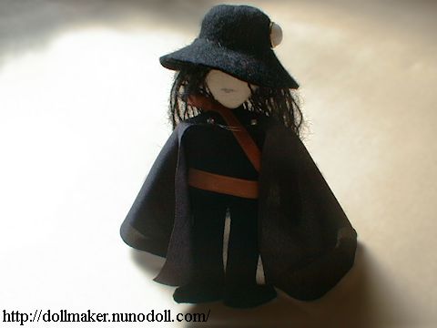 Put cloak and hat on