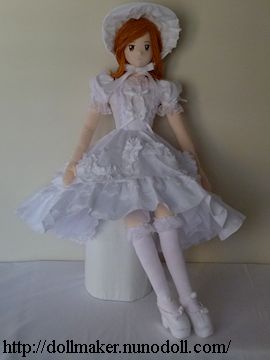 Girl doll in white dress