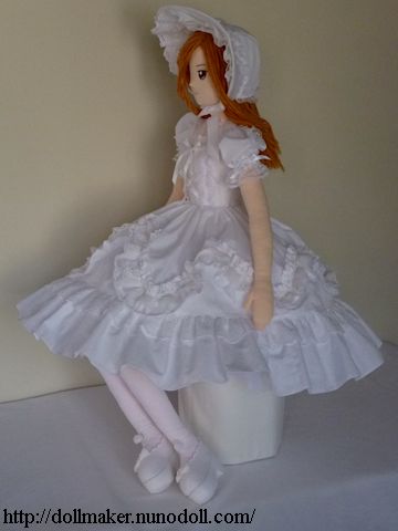 Girl doll in white dress