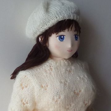 Doll in sweater