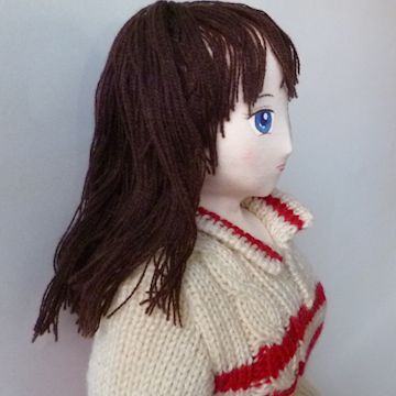 Doll in sweater